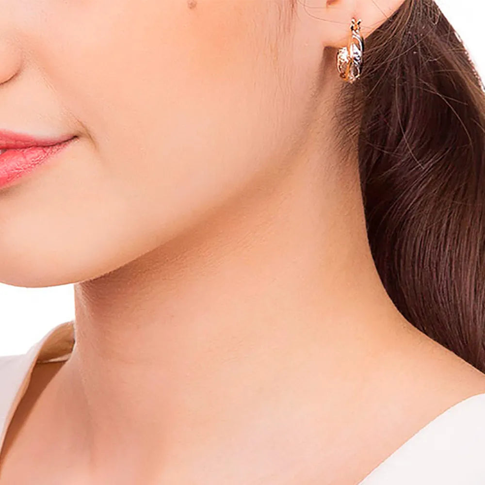 Wavy hoop earring plated in 18k gold with rhodium plating - 52038800